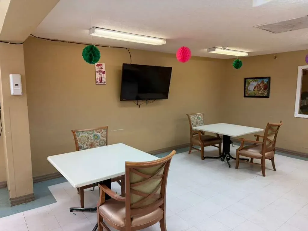 The dining room at Vivo Healthcare Clewiston, tables laid for a meal